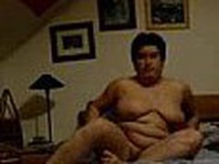 Well here's one more chubby aged mommy taping herself during a masturbation session in this episode clip. She fingers her pussy with as many fingers as she needs while showing off her heavy saggy mounds