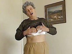 Sexy granny Rosa takes her raiment off and discloses that saggy tits of hers. That babe squeezes them for greater amount enjoyment and lays down on the bed. The lustful old lady spreads her legs and fingers her cunt a little. That babe has a vibrator and is ready to play with it. Want to watch her sucking and sticking it in her pussy?